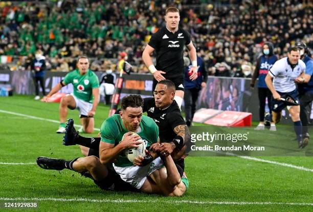 Wellington , New Zealand - 16 July 2022; Hugo Keenan of Ireland scores his side's second try during the Steinlager Series match between the New...