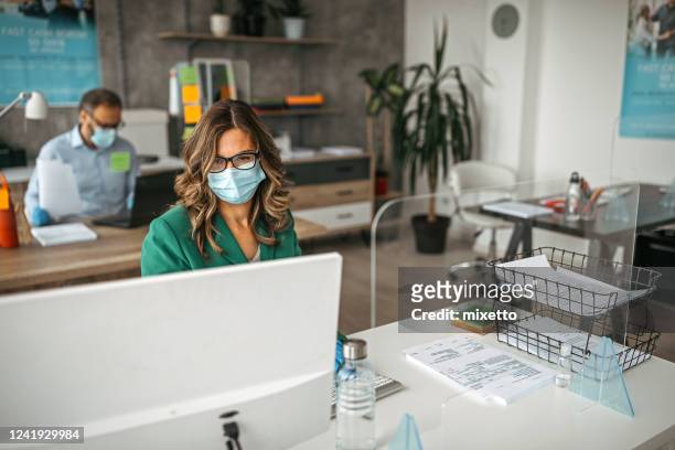 business colleagues working at office - bank office clerks stock pictures, royalty-free photos & images