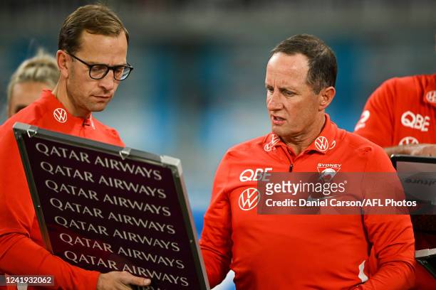 Don Pyke, Assistant Coach of the Swans works on the board during the 2022 AFL Round 18 match between the Fremantle Dockers and the Sydney Swans at...