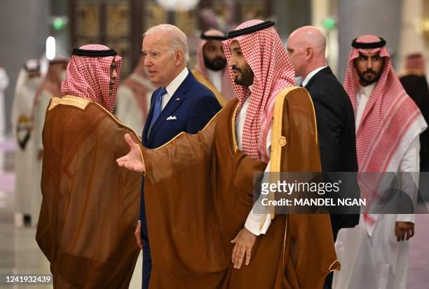 President Joe Biden and Saudi Crown Prince Mohammed bin Salman arrive for the family photo during the Jeddah Security and Development Summit at a...