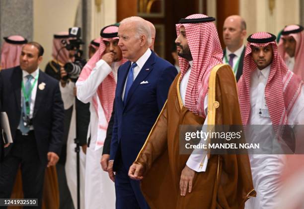 President Joe Biden and Saudi Crown Prince Mohammed bin Salman arrive for the family photo during the Jeddah Security and Development Summit at a...