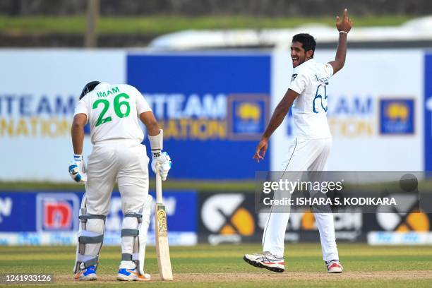 Sri Lanka's Kasun Rajitha celebrates after taking the wicket of Pakistans Imam-ul-Haq during the first day of play of the first cricket Test match...