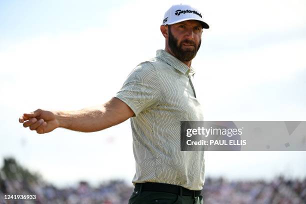 Golfer Dustin Johnson walks from the 2nd tee during his third round on day 3 of The 150th British Open Golf Championship on The Old Course at St...