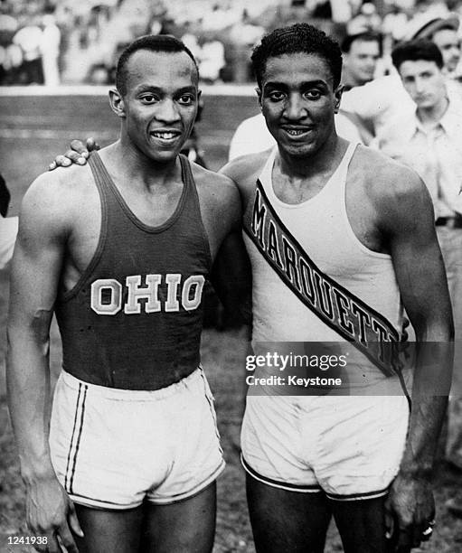 Jesse James Cleveland Owens on the left, an American athlete, the greatest sprinter of his generation who won four gold medals at the 1936 Olympics...