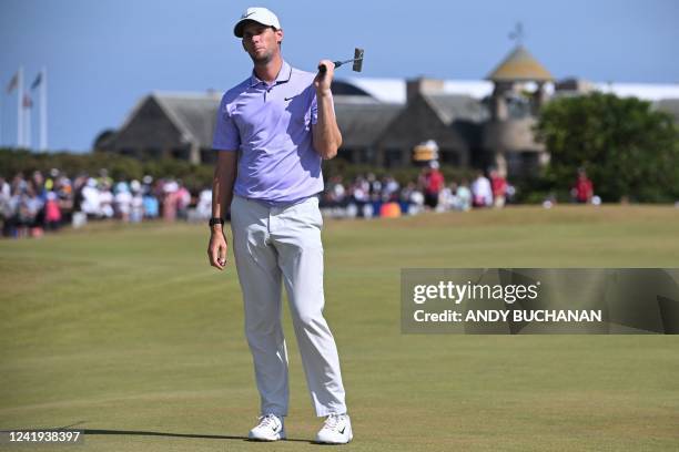 Belgium's Thomas Pieters reacts to missing a putt on the 16th green during his third round on day 3 of The 150th British Open Golf Championship on...