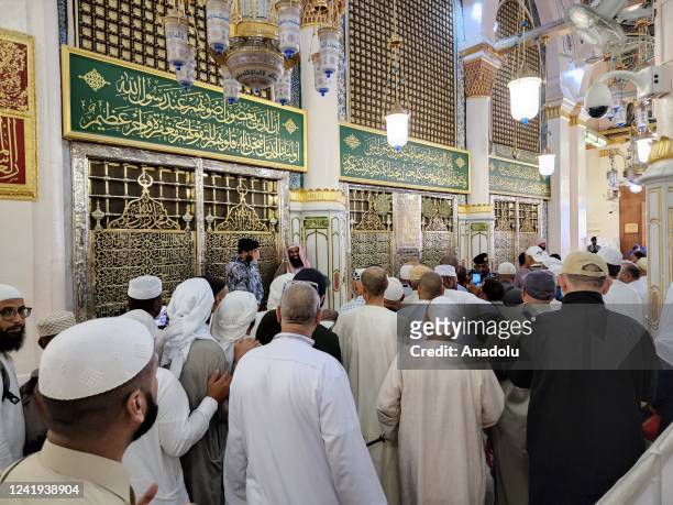 Muslims visit the Rawdah Mubarak , burial chamber of Prophet Muhammad, at Masjid al-Nabawi Al-Masjid an-Nabawi after completing the hajj pilgrimage,...