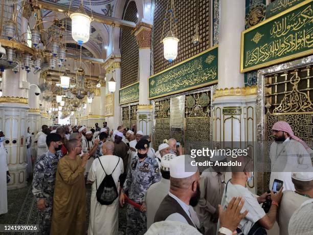 Muslims visit the Rawdah Mubarak , burial chamber of Prophet Muhammad, at Masjid al-Nabawi Al-Masjid an-Nabawi after completing the hajj pilgrimage,...