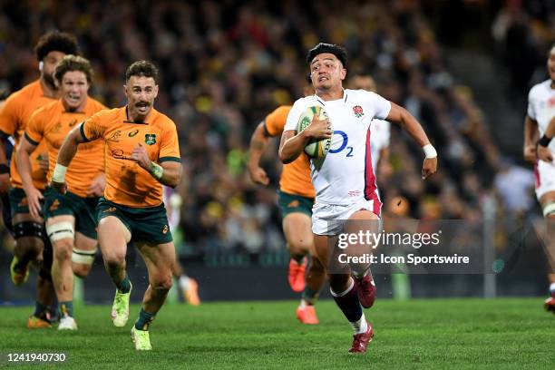 Marcus Smith of England runs the ball to score a try during the rugby international test match between Australia Wallabies and England at The Sydney...