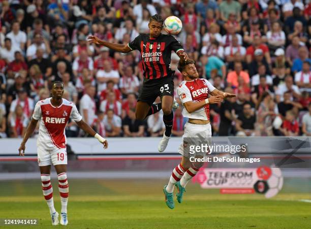 Emil Roback of AC Mailand and Jan Thielmann of 1. FC Koeln battle for the ball during the pre-season friendly match between 1. FC Köln and AC Milan...