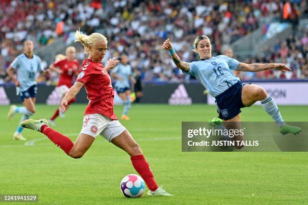 Denmark's striker Pernille Harder is challenged by Spain's defender Maria Leon during the UEFA Women's Euro 2022 Group B football match between...