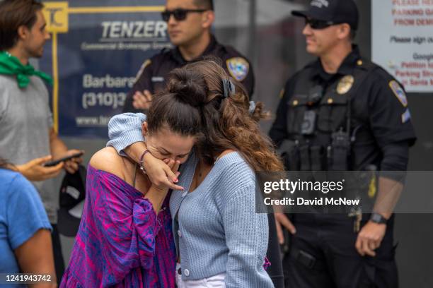 Woman is comforted during a protest march to a Planned Parenthood office, which was targeted by Proud Boys and an anti-abortion group the previous...
