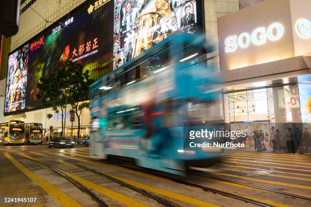Hong Kong, China, 15 Jul 2022, A tramway passes in Causeway Bay in this slow shutter pictures.