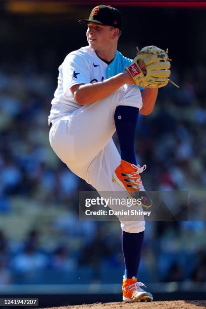 Kyle Harrison of the San Francisco Giants pitches in the third inning during the 2022 SiriusXM All-Star Futures Game at Dodger Stadium on Saturday,...