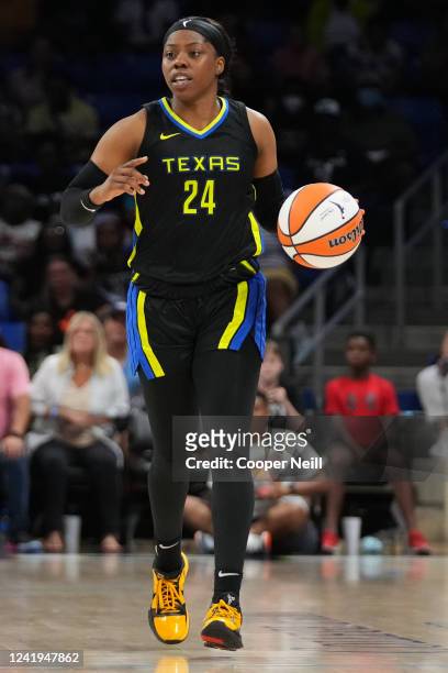 Arike Ogunbowale of the Dallas Wings dribbles the ball during the game against the Chicago Sky on July 16, 2022 at the College Park Center in...