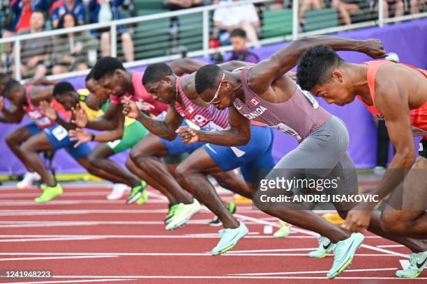 Athletes compete in the men's 100m final during the World Athletics Championships at Hayward Field in Eugene, Oregon on July 16, 2022.