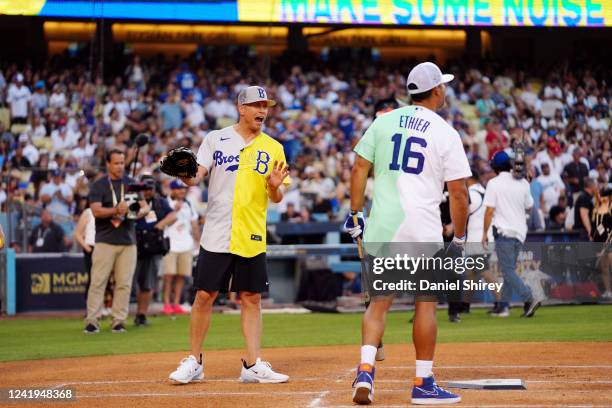 The Miz jokes with Andre Ethier during the MGM All-Star Celebrity Softball Game at Dodger Stadium on Saturday, July 16, 2022 in Los Angeles,...