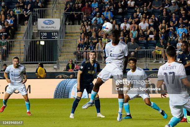 New England Revolution Midfielder Lucas Maciel Felix heads the ball during the second half of the Major League Soccer Match between the New England...