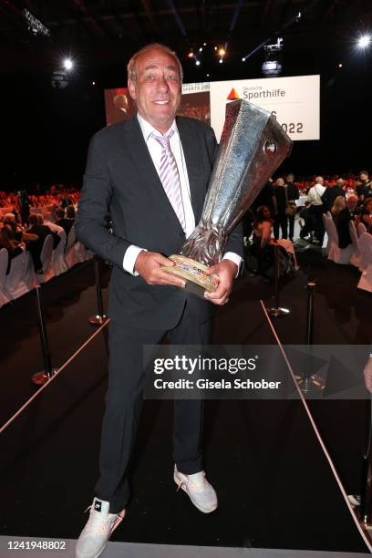 Peter Fischer, President of Eintracht Frankfurt soccer team with cup during the Ball des Sports 2022 gala, benefit for Deutsche Sporthilfe, at...