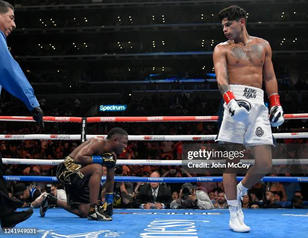 Ryan Garcia walks away from Javier Fortuna after knocking him out in the fifth round of a Super Lightweights bout at the Crypto.com Arena on July 16,...
