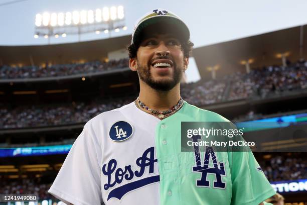 Bad Bunny looks on during the MGM All-Star Celebrity Softball Game at Dodger Stadium on Saturday, July 16, 2022 in Los Angeles, California.