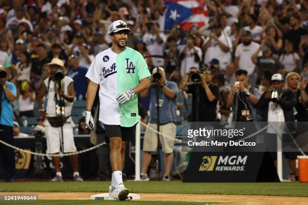 Bad Bunny looks on during the MGM All-Star Celebrity Softball Game at Dodger Stadium on Saturday, July 16, 2022 in Los Angeles, California.