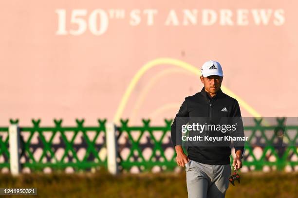 Xander Schauffele walks with his putter on the 18th hole green during the second round of The 150th Open Championship on The Old Course at St Andrews...