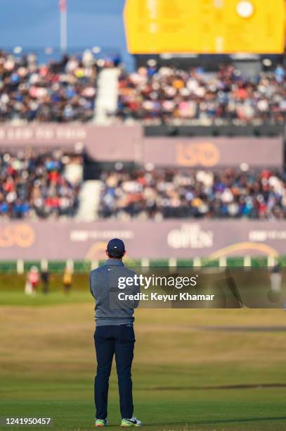 Rory McIlroy of Northern Ireland waits on the 18th hole tee as he looks towards the grandstand during the second round of The 150th Open Championship...