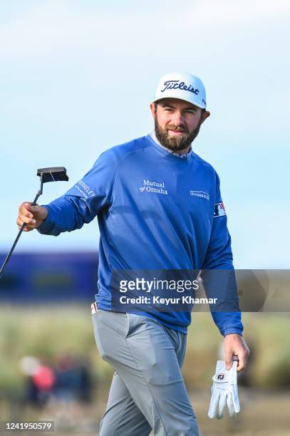 Cameron Young smiles on the 17th hole green during the second round of The 150th Open Championship on The Old Course at St Andrews on July 15, 2022...