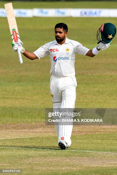 Pakistans captain Babar Azam celebrates after scoring a century during the second day of the first cricket Test match between Sri Lanka and Pakistan...