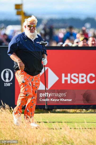 John Daly walks off of the 17th hole tee with his driver during the second round of The 150th Open Championship on The Old Course at St Andrews on...