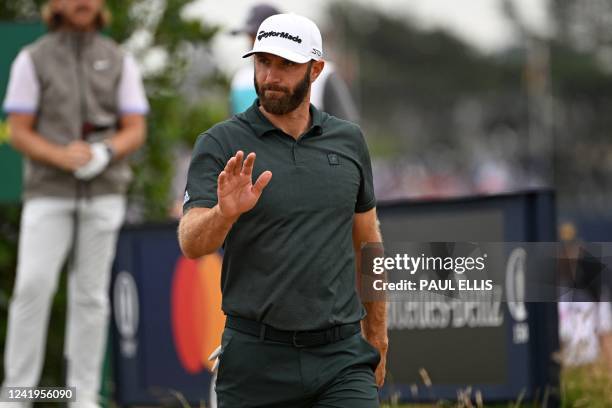Golfer Dustin Johnson leaves the 3rd tee during his final round on day 4 of The 150th British Open Golf Championship on The Old Course at St Andrews...