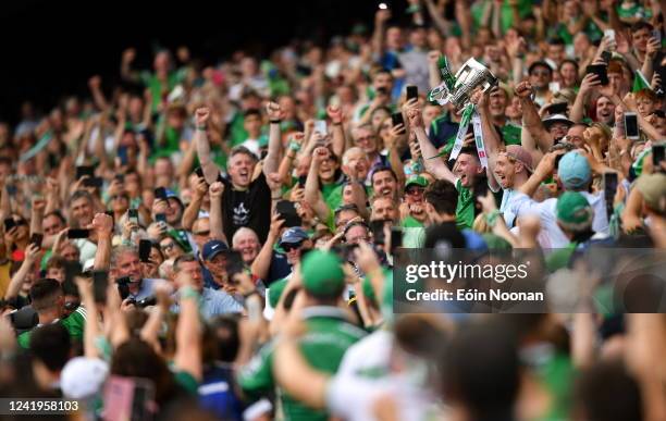 Dublin , Ireland - 17 July 2022; Declan Hannon, left, and Cian Lynch of Limerick lift the Liam MacCarthy Cup after the GAA Hurling All-Ireland Senior...