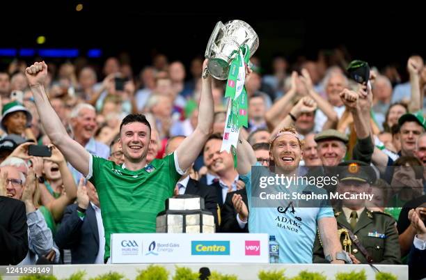 Dublin , Ireland - 17 July 2022; Declan Hannon, left, and Cian Lynch of Limerick lift the Liam MacCarthy Cup after the GAA Hurling All-Ireland Senior...