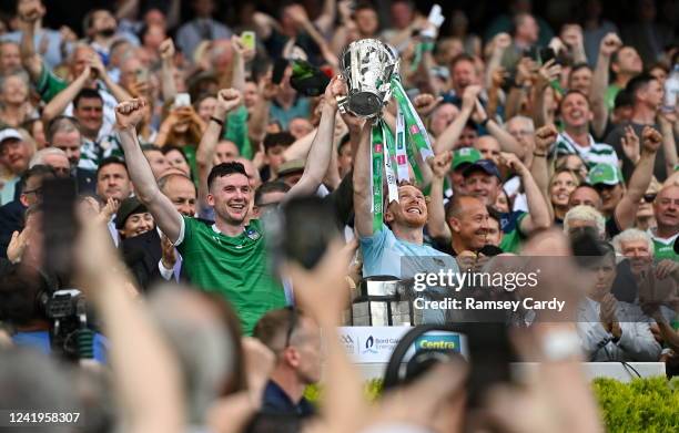 Dublin , Ireland - 17 July 2022; Declan Hannon, left, and Cian Lynch of Limerick lift the Liam MacCarthy Cup after the GAA Hurling All-Ireland Senior...