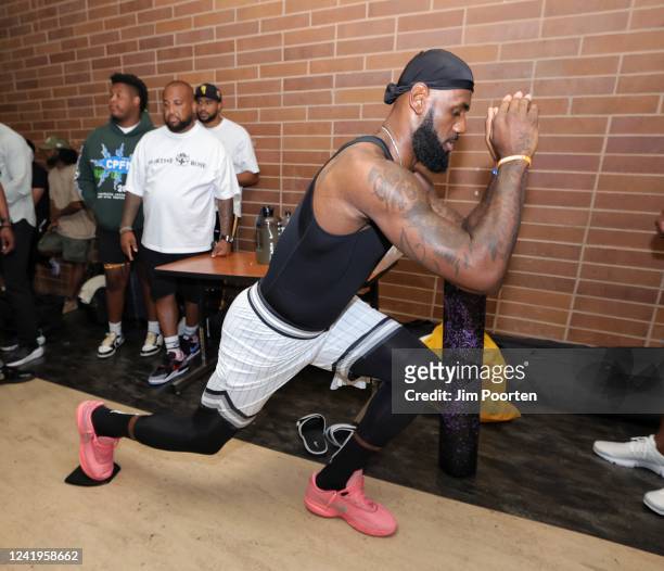 LeBron James of the Los Angeles Lakers warms up before the game at Drew League on July 16, 2022 at King/Drew Magnet High School in Los Angeles,...