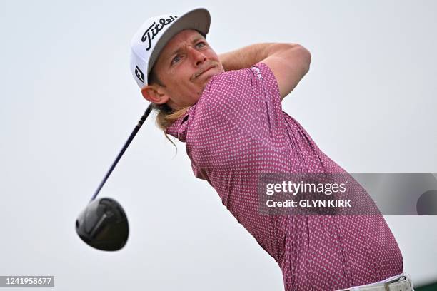 Australia's Cameron Smith watches his drive from the 15th tee during his final round on day 4 of The 150th British Open Golf Championship on The Old...