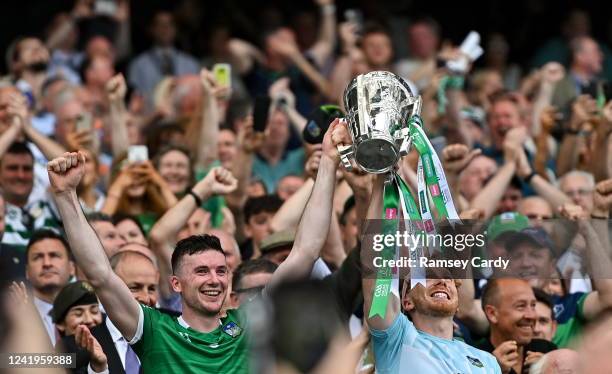 Dublin , Ireland - 17 July 2022; Declan Hannon, left, and Cian Lynch of Limerick lift the Liam MacCarthy Cup after the GAA Hurling All-Ireland Senior...