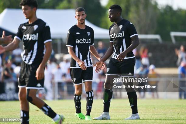 Waniss TAIBI of Angers Sco and Ulrick ENEME ELLA of Angers Sco during the friendly match between Angers and Laval on July 17, 2022 in Segre, France.