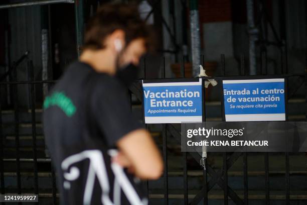 Man waits in line to recieve the Monkeypox vaccine before the opening of a new mass vaccination site at the Bushwick Education Campus in Brooklyn on...