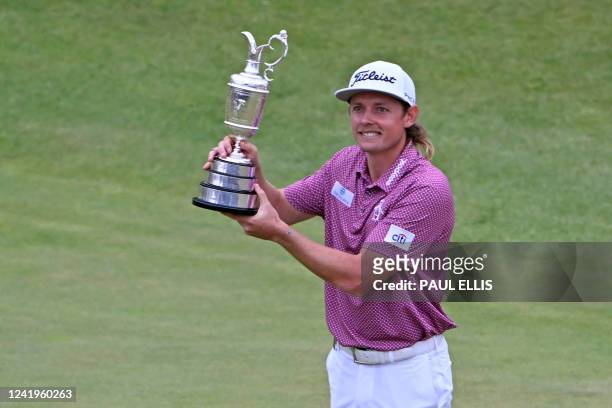 Australia's Cameron Smith poses with the Claret Jug, the trophy for the Champion golfer of the year after winning the 150th British Open Golf...