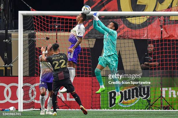 Orlando defender Antonio Carlos heads the ball during the MLS match between Orlando City SC and Atlanta United FC on July 17th, 2022 at Mercedes-Benz...