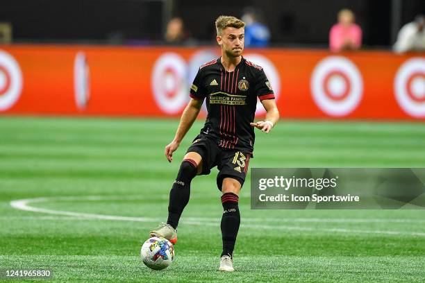 Atlanta midfielder Amar Sejdic looks to pass the ball during the MLS match between Orlando City SC and Atlanta United FC on July 17th, 2022 at...