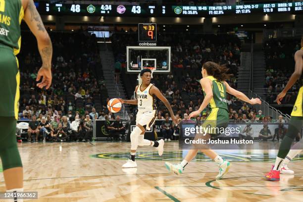 Danielle Robinson of the Indiana Fever handles the ball during the game against the Seattle Storm on July 17, 2022 at the Climate Pledge Arena in...