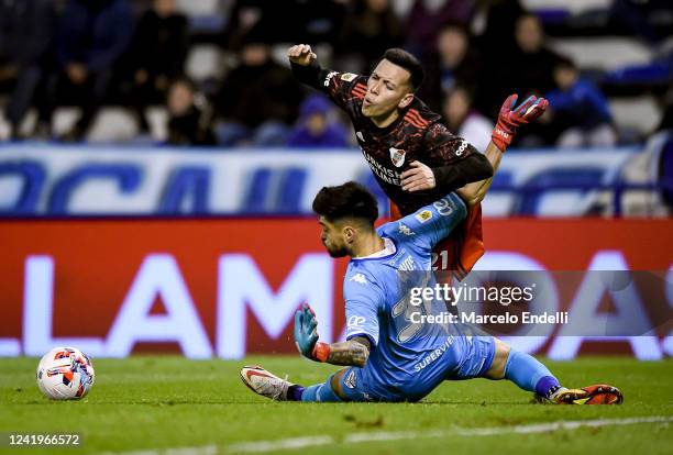 Esequiel Barco of River Plate fights for the ball with Lucas Hoyos of Velez Sarsfield during a match between Velez Sarsfield and River Plate as part...