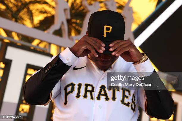 Termarr Johnson shows off his hat after he was selected fourth overall by the Pittsburgh Pirates during the 2022 Major League Baseball Draft at L.A....