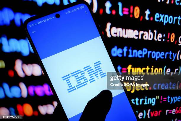In this photo illustration, an IBM logo is displayed on an android mobile phone.