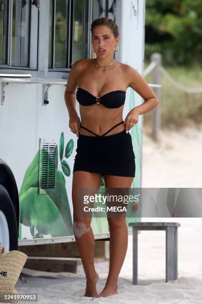 Sports Illustrated model Kara Del Toro hits the beach for a photoshoot in a black bikini in Miami. 16 Jul 2022