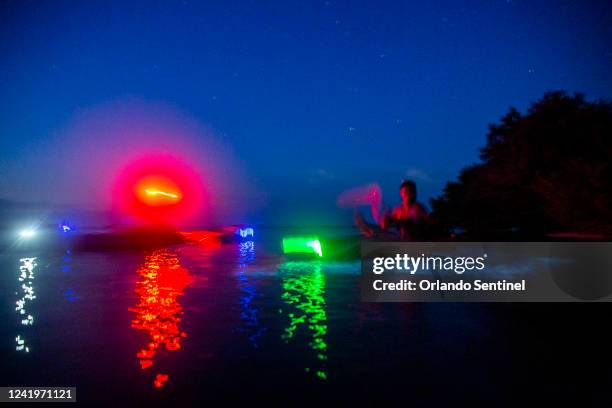 Bioluminescence is the blue-glowing wonder caused by micro algae called dinoflagellates, seen in Mosquito Lagoon near Merritt Island on Saturday,...