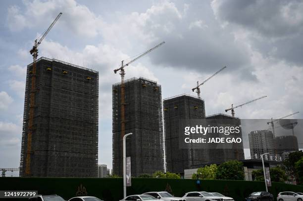 General view shows Evergrande residential buildings under construction in Guangzhou, in China's southern Guangdong province on July 18, 2022.