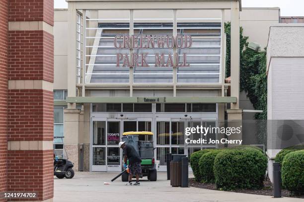 Mall employee works outside of the food court entrance to Greenwood Park Mall on July 18, 2022 in Greenwood, Indiana. On July 17, a gunman reportedly...